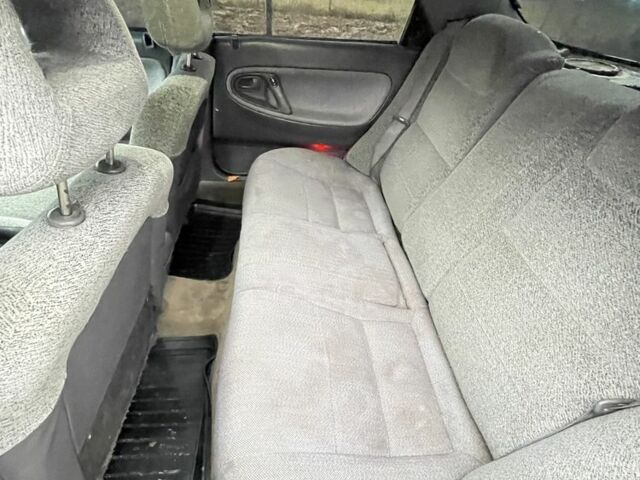 Чорний Мазда 626, об'ємом двигуна 2 л та пробігом 250 тис. км за 1150 $, фото 8 на Automoto.ua