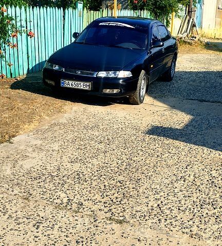 Черный Мазда 626, объемом двигателя 2 л и пробегом 0 тыс. км за 1900 $, фото 1 на Automoto.ua