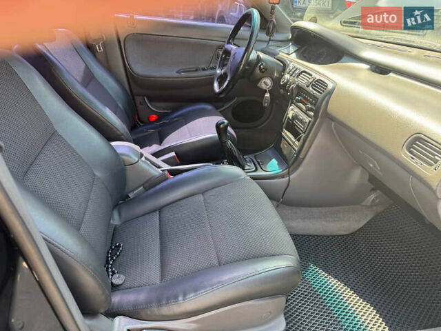 Черный Мазда 626, объемом двигателя 1.79 л и пробегом 310 тыс. км за 2999 $, фото 15 на Automoto.ua