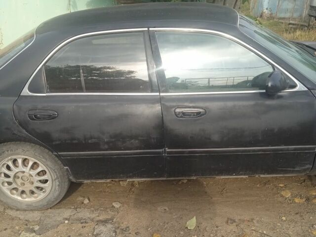 Черный Мазда 626, объемом двигателя 0 л и пробегом 300 тыс. км за 1069 $, фото 7 на Automoto.ua