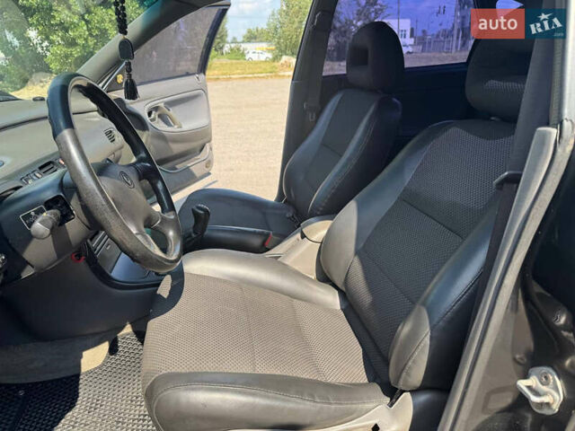 Черный Мазда 626, объемом двигателя 1.79 л и пробегом 310 тыс. км за 2999 $, фото 11 на Automoto.ua