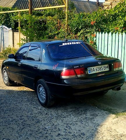 Черный Мазда 626, объемом двигателя 2 л и пробегом 0 тыс. км за 1900 $, фото 2 на Automoto.ua