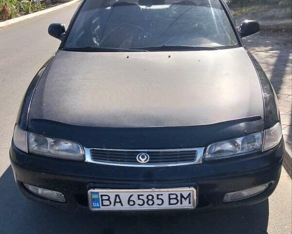 Чорний Мазда 626, об'ємом двигуна 2 л та пробігом 200 тис. км за 1700 $, фото 1 на Automoto.ua