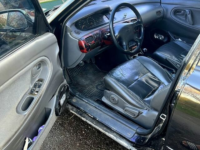 Чорний Мазда 626, об'ємом двигуна 2 л та пробігом 0 тис. км за 1400 $, фото 4 на Automoto.ua