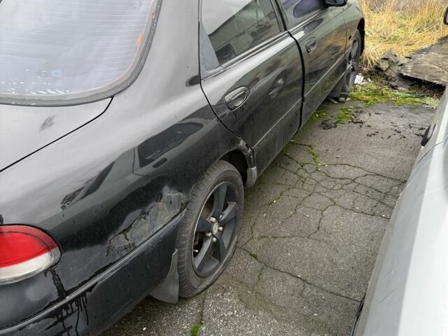 Черный Мазда 626, объемом двигателя 1.8 л и пробегом 390 тыс. км за 993 $, фото 6 на Automoto.ua