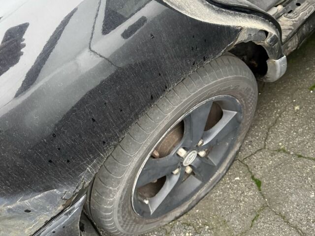 Черный Мазда 626, объемом двигателя 1.8 л и пробегом 390 тыс. км за 993 $, фото 4 на Automoto.ua