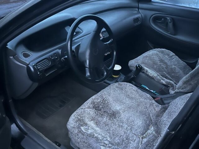 Чорний Мазда 626, об'ємом двигуна 2 л та пробігом 3 тис. км за 1999 $, фото 1 на Automoto.ua