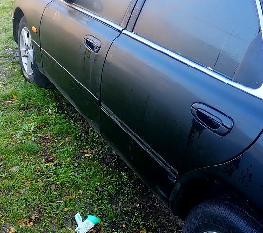 Чорний Мазда 626, об'ємом двигуна 2 л та пробігом 200 тис. км за 2000 $, фото 3 на Automoto.ua