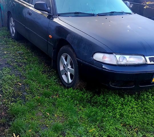 Чорний Мазда 626, об'ємом двигуна 2 л та пробігом 200 тис. км за 2000 $, фото 1 на Automoto.ua