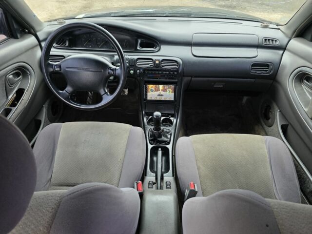 Черный Мазда 626, объемом двигателя 2 л и пробегом 250 тыс. км за 1500 $, фото 4 на Automoto.ua