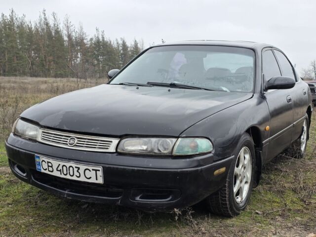 Черный Мазда 626, объемом двигателя 2 л и пробегом 250 тыс. км за 1500 $, фото 1 на Automoto.ua