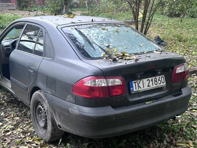 Мазда 626 2000 у Житомирі на Automoto.ua Чорний Мазда 626, об'ємом двигуна 2 л та пробігом 374 тис. км за 550 $, фото 5 на Automoto.ua