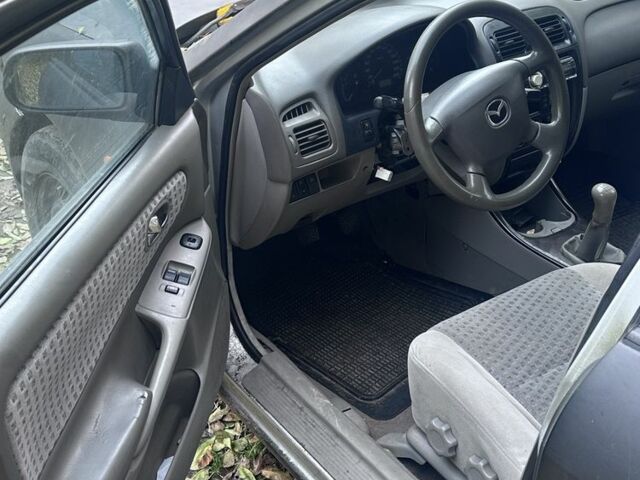 Мазда 626 2000 у Житомирі на Automoto.ua Чорний Мазда 626, об'ємом двигуна 2 л та пробігом 374 тис. км за 550 $, фото 3 на Automoto.ua