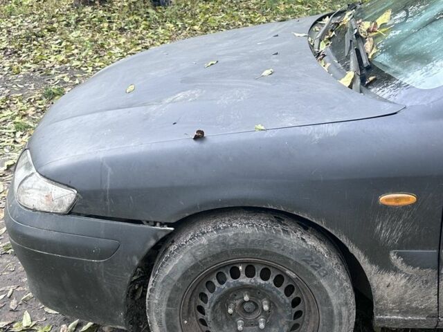 Мазда 626 2000 у Житомирі на Automoto.ua Чорний Мазда 626, об'ємом двигуна 2 л та пробігом 374 тис. км за 550 $, фото 2 на Automoto.ua