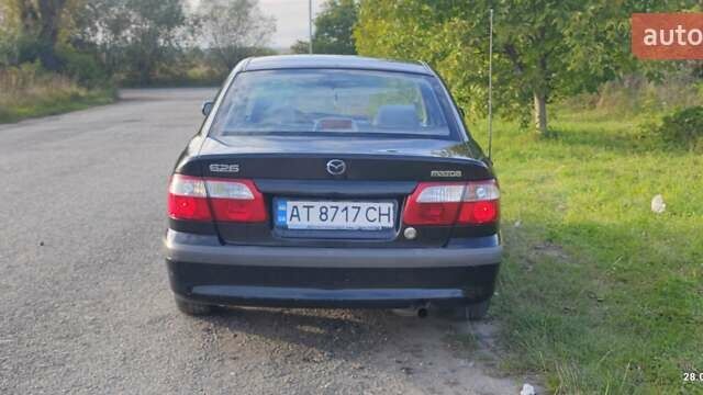 Черный Мазда 626, объемом двигателя 2 л и пробегом 260 тыс. км за 2700 $, фото 7 на Automoto.ua