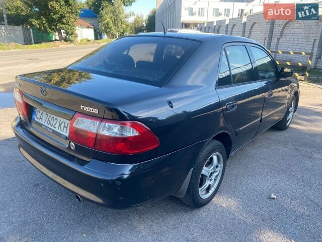 Чорний Мазда 626, об'ємом двигуна 2 л та пробігом 370 тис. км за 2500 $, фото 5 на Automoto.ua