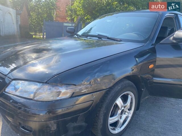 Чорний Мазда 626, об'ємом двигуна 2 л та пробігом 370 тис. км за 2500 $, фото 1 на Automoto.ua