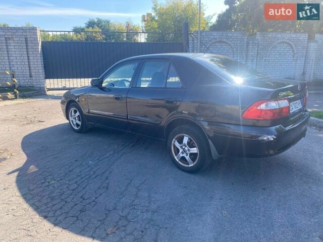 Чорний Мазда 626, об'ємом двигуна 2 л та пробігом 370 тис. км за 2500 $, фото 2 на Automoto.ua