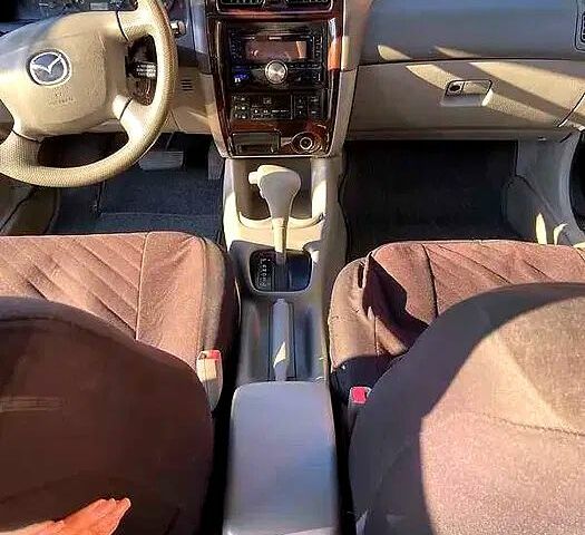 Черный Мазда 626, объемом двигателя 2 л и пробегом 208 тыс. км за 3000 $, фото 9 на Automoto.ua