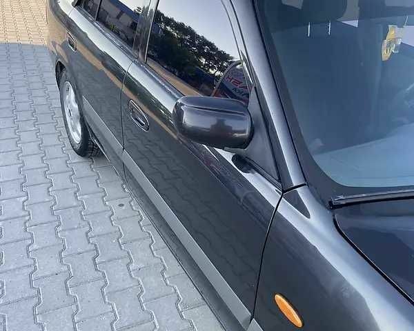 Черный Мазда 626, объемом двигателя 2 л и пробегом 210 тыс. км за 3000 $, фото 14 на Automoto.ua