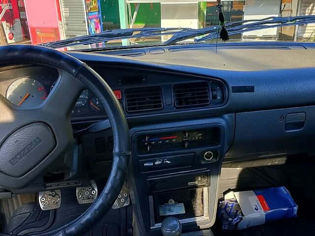 Черный Мазда 626, объемом двигателя 2 л и пробегом 300 тыс. км за 1100 $, фото 3 на Automoto.ua