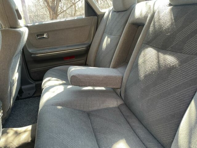 Черный Мазда 626, объемом двигателя 2 л и пробегом 320 тыс. км за 950 $, фото 6 на Automoto.ua