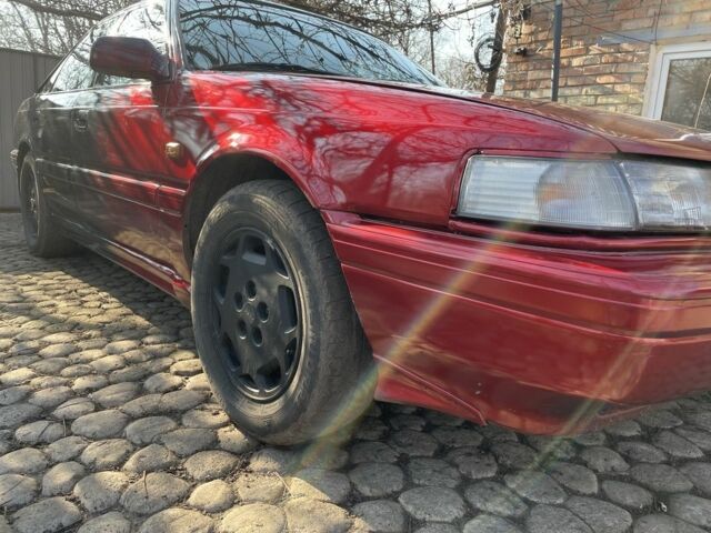 Черный Мазда 626, объемом двигателя 2 л и пробегом 320 тыс. км за 950 $, фото 2 на Automoto.ua