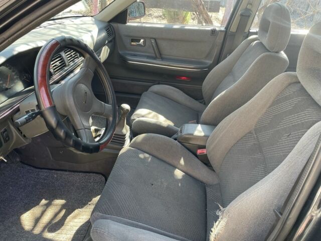 Черный Мазда 626, объемом двигателя 2 л и пробегом 320 тыс. км за 950 $, фото 8 на Automoto.ua