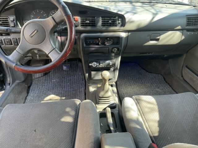 Черный Мазда 626, объемом двигателя 2 л и пробегом 320 тыс. км за 950 $, фото 5 на Automoto.ua