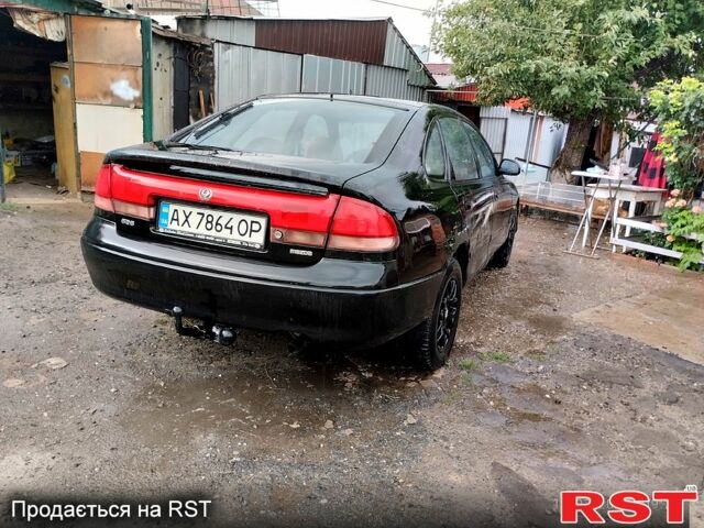 Черный Мазда 626, объемом двигателя 2.2 л и пробегом 0 тыс. км за 1350 $, фото 2 на Automoto.ua