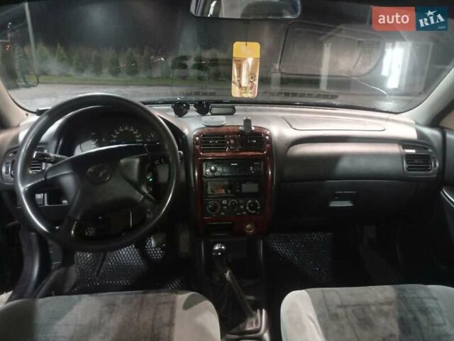 Фіолетовий Мазда 626, об'ємом двигуна 1.8 л та пробігом 350 тис. км за 2500 $, фото 31 на Automoto.ua