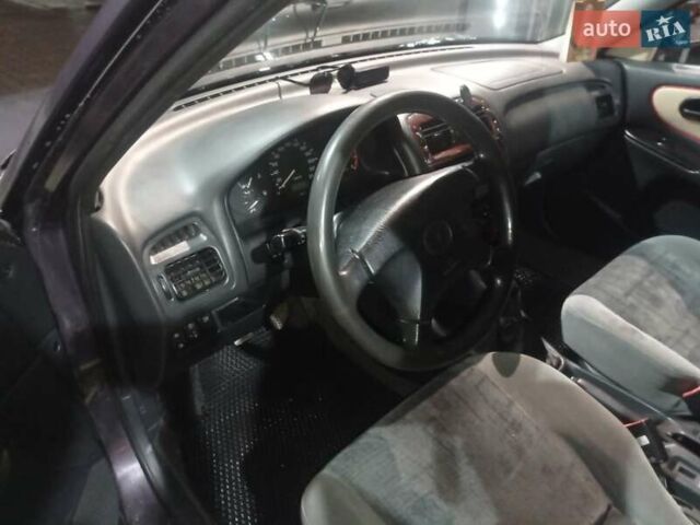 Фіолетовий Мазда 626, об'ємом двигуна 1.8 л та пробігом 350 тис. км за 2500 $, фото 32 на Automoto.ua