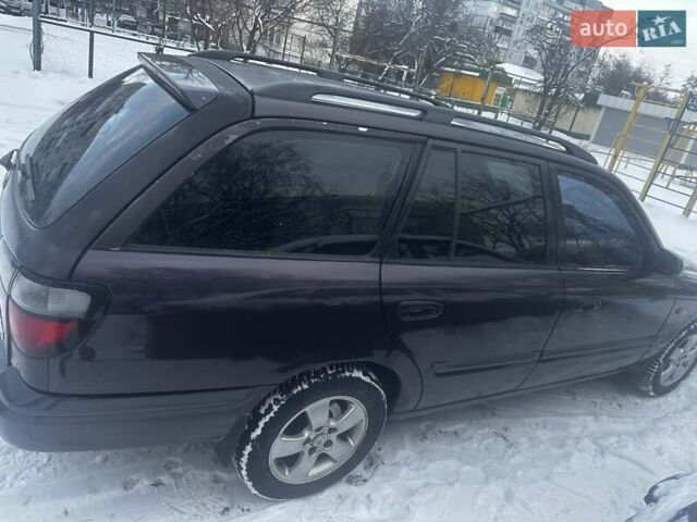 Фиолетовый Мазда 626, объемом двигателя 1.99 л и пробегом 350 тыс. км за 2800 $, фото 4 на Automoto.ua