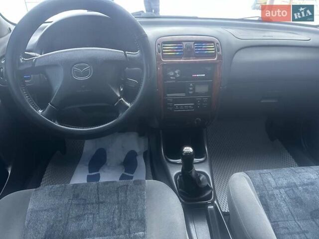 Фиолетовый Мазда 626, объемом двигателя 1.99 л и пробегом 350 тыс. км за 2800 $, фото 9 на Automoto.ua