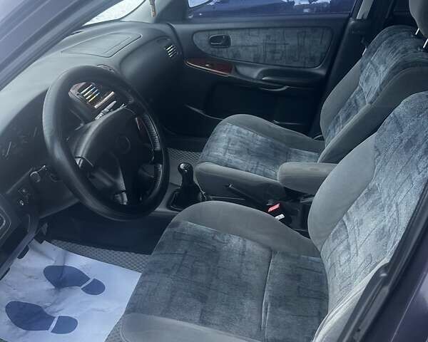 Фиолетовый Мазда 626, объемом двигателя 1.99 л и пробегом 350 тыс. км за 2800 $, фото 7 на Automoto.ua