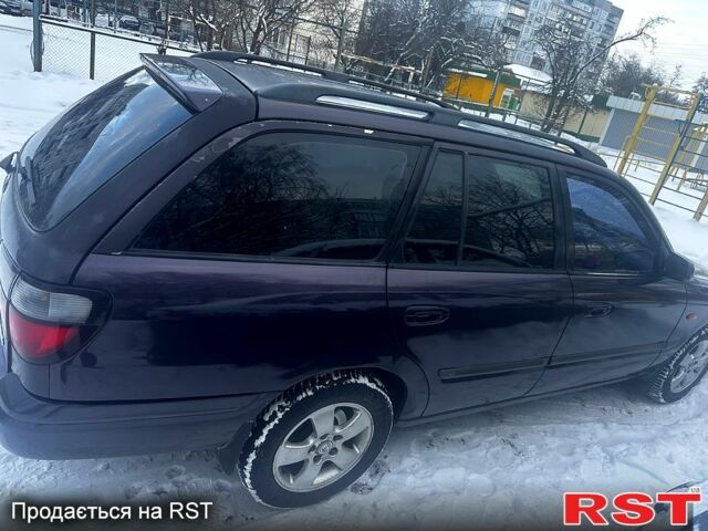 Фиолетовый Мазда 626, объемом двигателя 2 л и пробегом 350 тыс. км за 2800 $, фото 3 на Automoto.ua