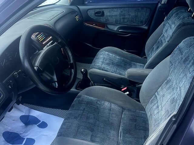 Фиолетовый Мазда 626, объемом двигателя 2 л и пробегом 350 тыс. км за 2800 $, фото 8 на Automoto.ua