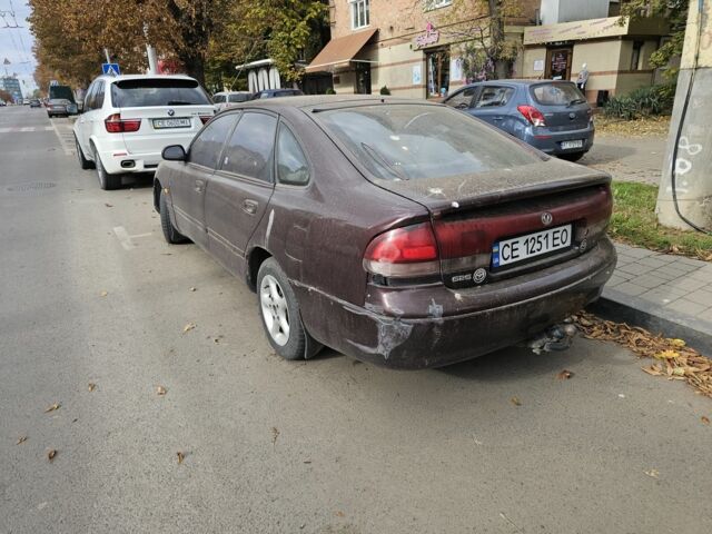 Коричневый Мазда 626, объемом двигателя 2 л и пробегом 290 тыс. км за 1150 $, фото 5 на Automoto.ua