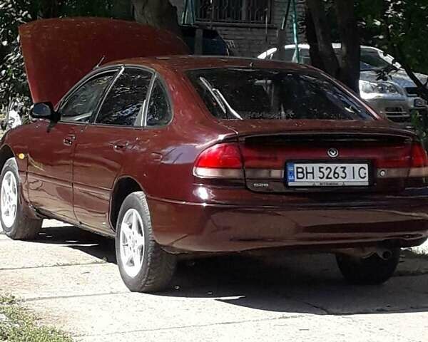 Коричневый Мазда 626, объемом двигателя 2 л и пробегом 300 тыс. км за 3300 $, фото 4 на Automoto.ua