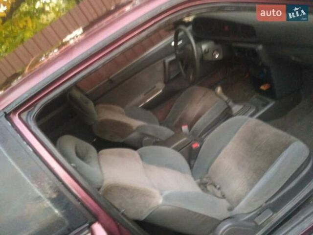 Коричневый Мазда 626, объемом двигателя 2 л и пробегом 150 тыс. км за 850 $, фото 3 на Automoto.ua