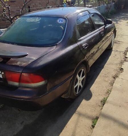 Коричневый Мазда 626, объемом двигателя 1.8 л и пробегом 200 тыс. км за 1161 $, фото 3 на Automoto.ua