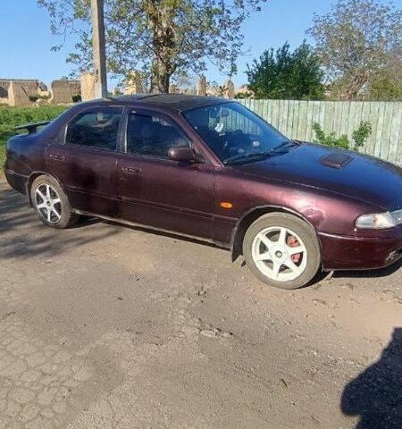 Коричневый Мазда 626, объемом двигателя 1.8 л и пробегом 200 тыс. км за 1161 $, фото 1 на Automoto.ua