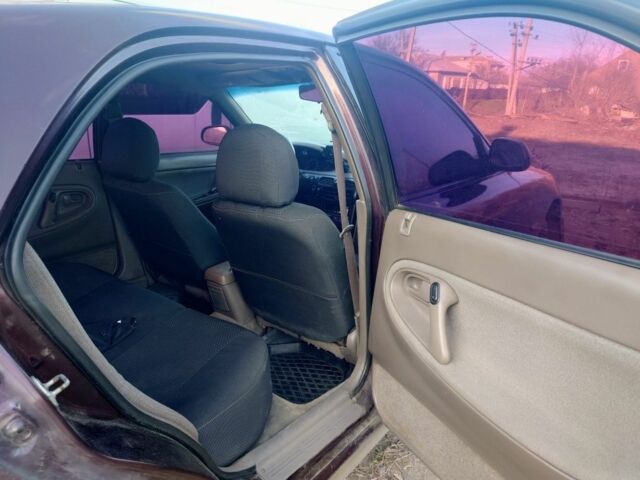 Коричневий Мазда 626, об'ємом двигуна 2 л та пробігом 304 тис. км за 1600 $, фото 18 на Automoto.ua