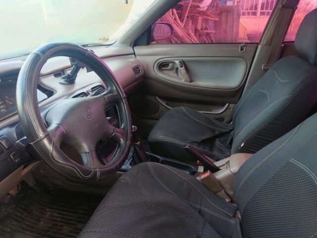 Коричневий Мазда 626, об'ємом двигуна 2 л та пробігом 304 тис. км за 1600 $, фото 16 на Automoto.ua