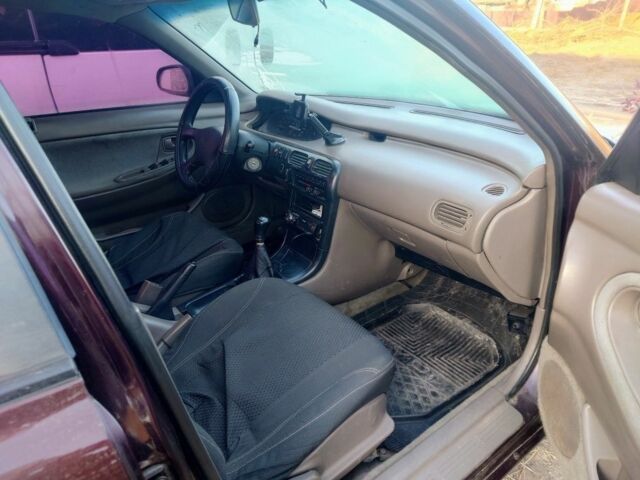 Коричневий Мазда 626, об'ємом двигуна 2 л та пробігом 304 тис. км за 1600 $, фото 19 на Automoto.ua