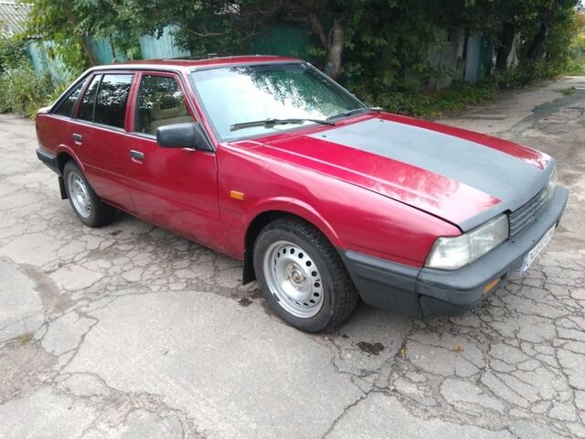 Красный Мазда 626, объемом двигателя 2 л и пробегом 250 тыс. км за 1212 $, фото 1 на Automoto.ua