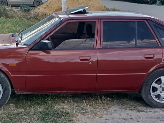 Червоний Мазда 626, об'ємом двигуна 2 л та пробігом 1000 тис. км за 1650 $, фото 1 на Automoto.ua