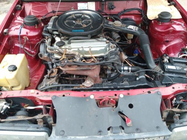 Красный Мазда 626, объемом двигателя 2 л и пробегом 250 тыс. км за 1212 $, фото 5 на Automoto.ua