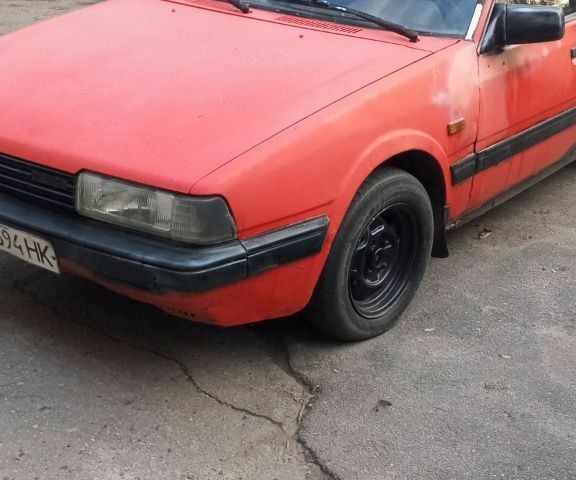 Красный Мазда 626, объемом двигателя 0 л и пробегом 11 тыс. км за 595 $, фото 5 на Automoto.ua