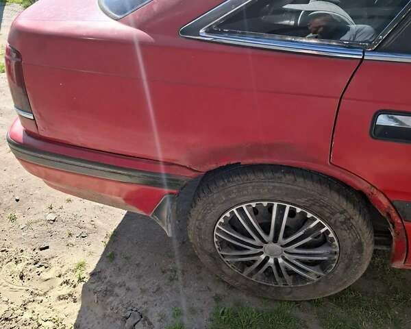 Красный Мазда 626, объемом двигателя 2 л и пробегом 209 тыс. км за 900 $, фото 5 на Automoto.ua